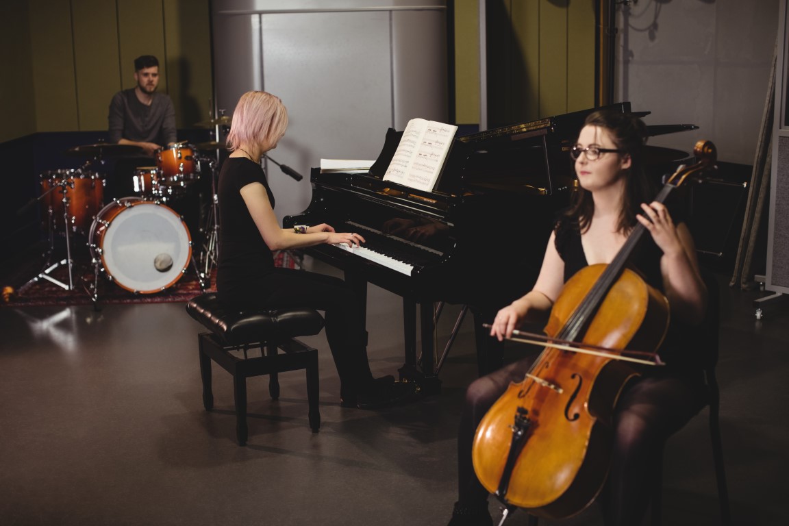 group students playing double bass drum set piano Medium